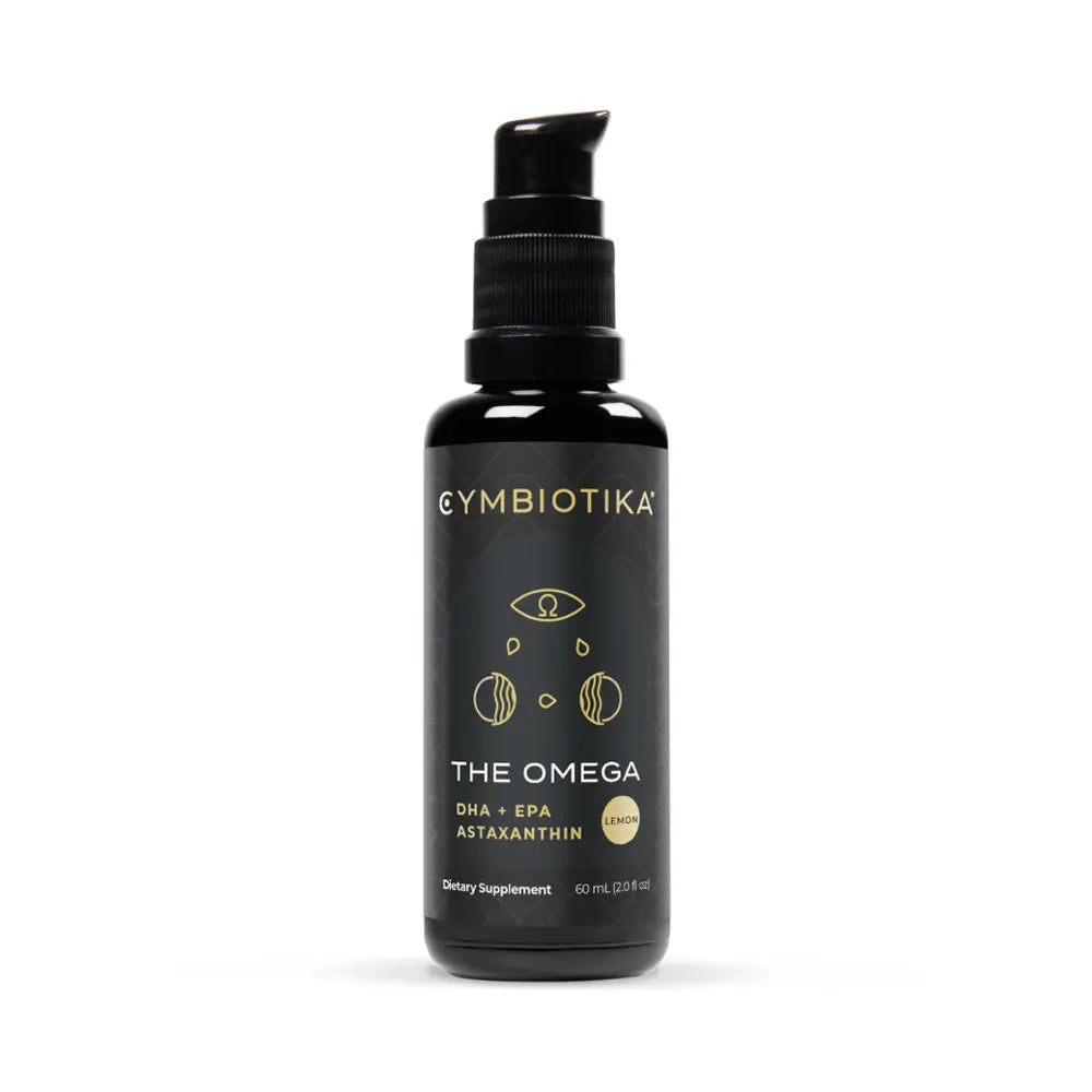 A black pump bottle of Cymbiotika The Omega dietary supplement with gold lettering and graphics, set against a plain white background.