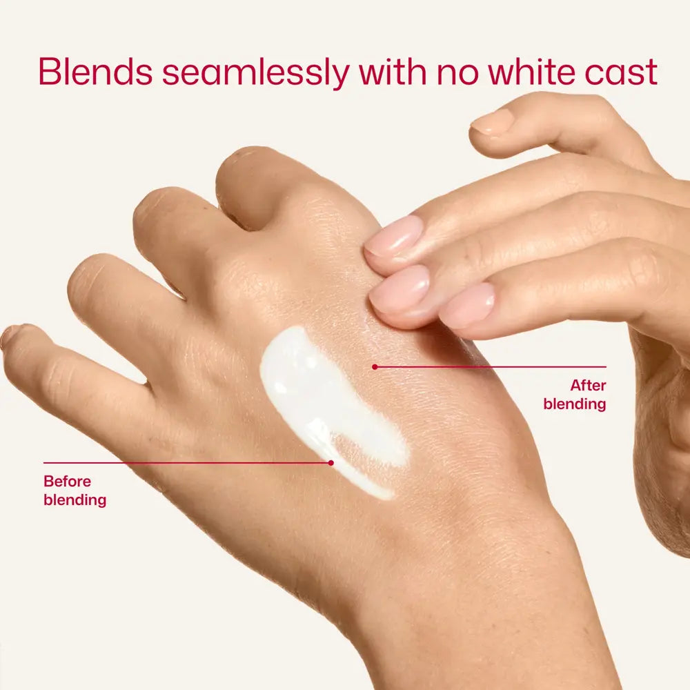 Hand applying EltaMD UV Clear Blemish-Prone and Oil Balancing SPF 50 to another hand with text indicating 'Blends seamlessly with no white cast'.