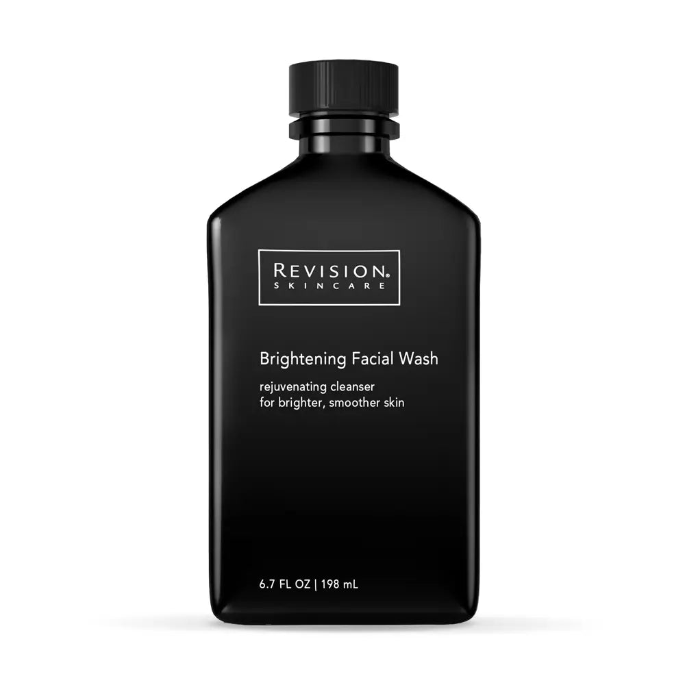 Black bottle of Revision Skincare Brightening Facial Wash on a white background