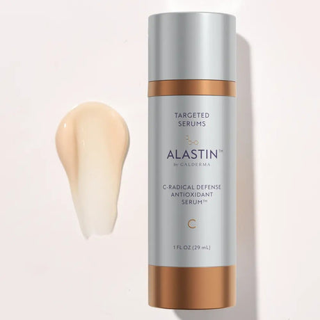 Alastin C-Radical Defense Antioxidant Serum bottle with a swatch of serum on a light background