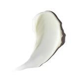 A thick, creamy white Alastin Ultra Calm Cleansing Cream smear, likely a lotion or cream, shown on a solid white background with a soft shadow.