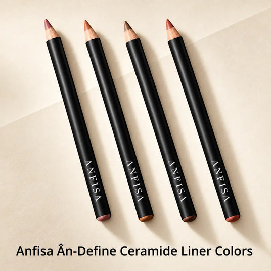 Four Anfisa lip liner pencils arranged diagonally on a light beige background with text at the bottom reading 'Anfisa Án-Define Ceramide Liner Colors'.