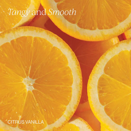A close-up arrangement of bright orange citrus slices with the text 'Tangy and Smooth' at the top and 'CITRUS VANILLA' at the bottom left.