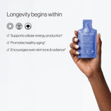 Cynbiotika NAD+ product held by a hand with promotional text on a white background