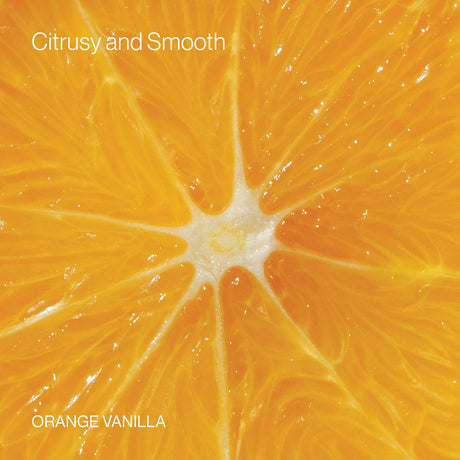 Close-up of an orange slice with 'Citrusy and Smooth' and 'Orange Vanilla' text.