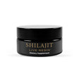 A black jar of Cymbiotika Shilajit Live Resin dietary supplement with gold and white lettering, set against a plain white background.