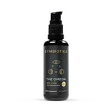 A black pump bottle of Cymbiotika The Omega dietary supplement with gold lettering and graphics, set against a plain white background.