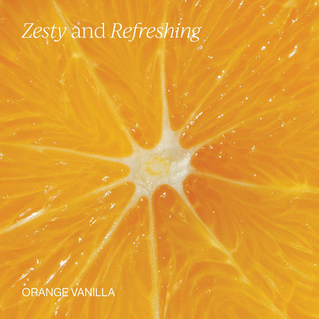 Close-up of a sliced orange with white text reading 'Zesty and Refreshing' at the top and 'ORANGE VANILLA' at the bottom, suggesting a fragrance or flavor product.