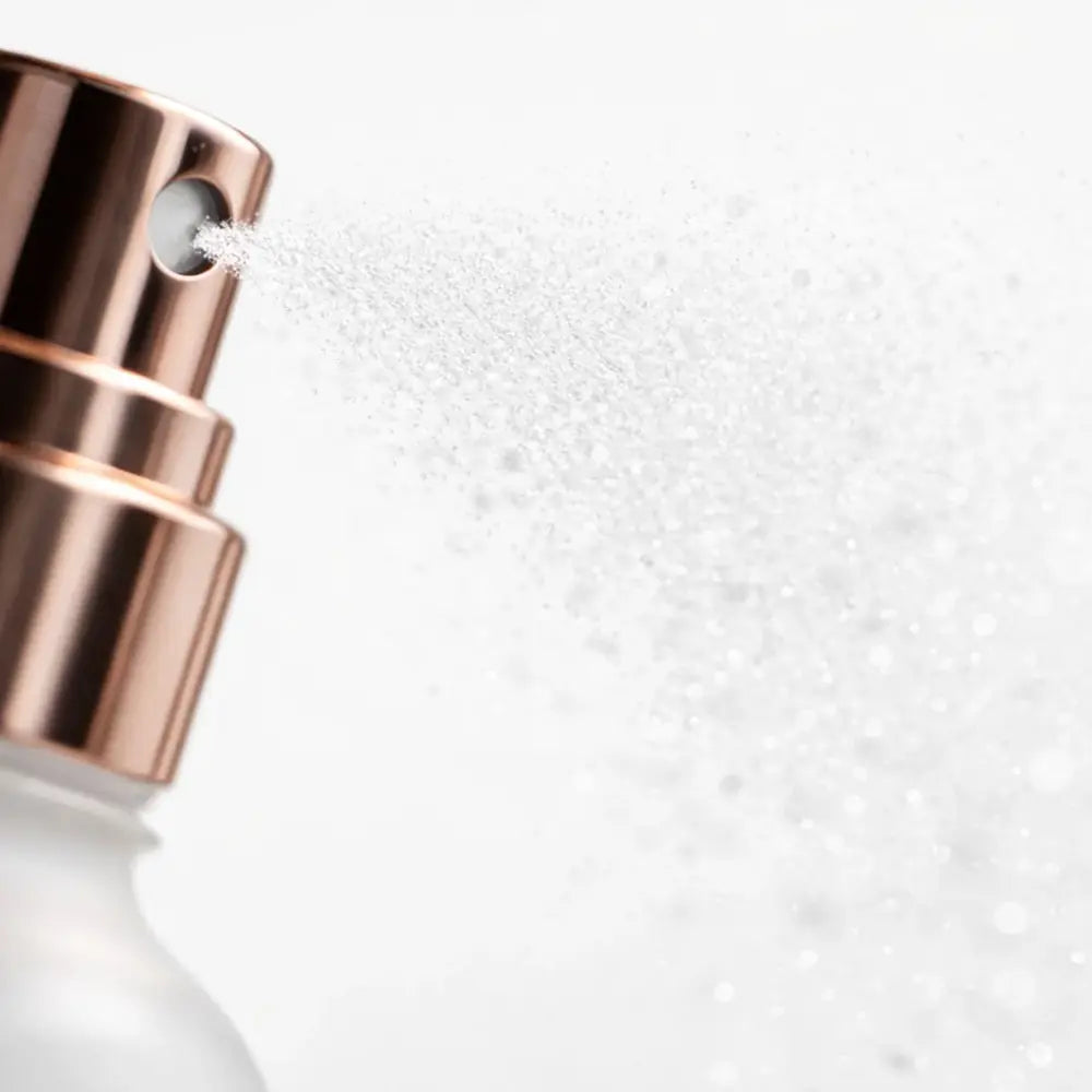 Fine mist spraying from the rose gold nozzle of Elevai HOCl Allantoin Active Cleanser Spray