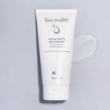 Face Reality Active Clarity Gel Cleanser tube next to a swatch of its clear gel texture