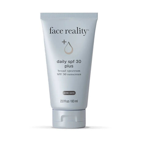 Tube of 'face reality' daily SPF 30 plus sunscreen on a white background