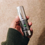 Neogenesis Mandelic Acid 8% on a woman's hand - Your Skincare Source