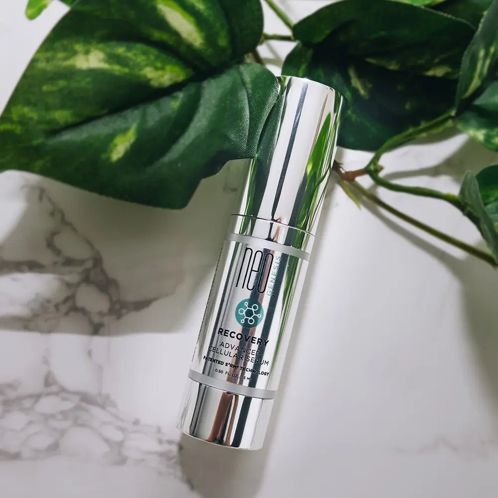 NeoGenesis Recovery serum bottle with green leaves in the background