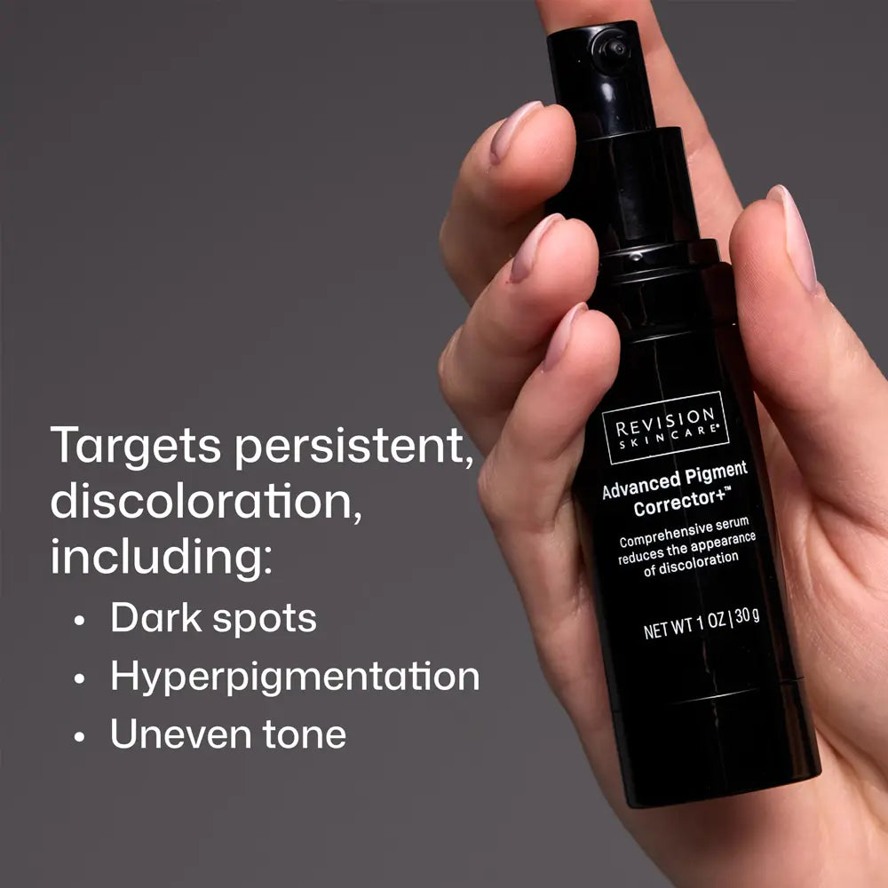 A hand holding a Revision Dermatology Advanced Pigment Corrector+ serum bottle against a dark gray background, with white text on the left listing skin concerns it targets: dark spots, hyperpigmentation, and uneven tone.
