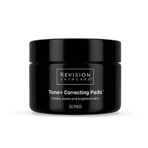 A jar of Revision Skincare Tone+ Correcting Pads that visibly evens and brightens skin on a clean white background.