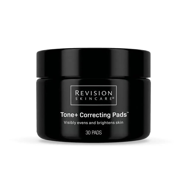 A jar of Revision Skincare Tone+ Correcting Pads that visibly evens and brightens skin on a clean white background.