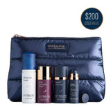 Skinbetter Science Plump and Protect Daily Set featuring a navy blue puffer pouch and four skincare bottles (cleanser, toner, serum, and treatment) displayed on a white background with a '$200 $253 VALUE' badge in the top right corner.