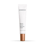 A white squeeze tube of SkinMedica Even and Correct Dark Spot Cream with a metallic rose gold cap, centered on a clean white background.
