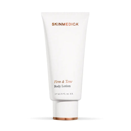 A white tube of SkinMedica Firm & Tone Body Lotion with rose gold lettering, set against a clean white background with a soft shadow.