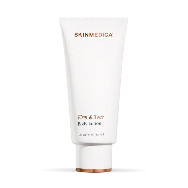 A white tube of SkinMedica Firm & Tone Body Lotion with rose gold lettering, set against a clean white background with a soft shadow.