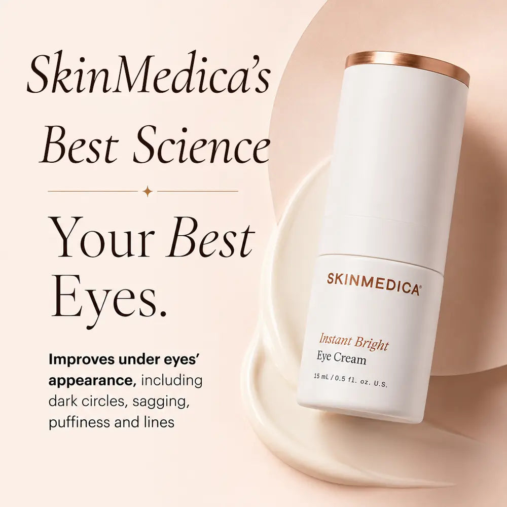 SkinMedica Instant Bright Eye Cream in a white cylindrical bottle with a metallic rose gold cap, displayed on a cream-colored background with product dark circles and sagging improvement benefits