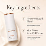 A white SKINMEDICA Instant Bright Eye Cream bottle with a metallic rose gold cap, displayed on a cream-colored background with a swirl of cream. The image includes text highlighting key ingredients: Hyaluronic Acid Blend and Vitis Flower Stem Cell Extract.
