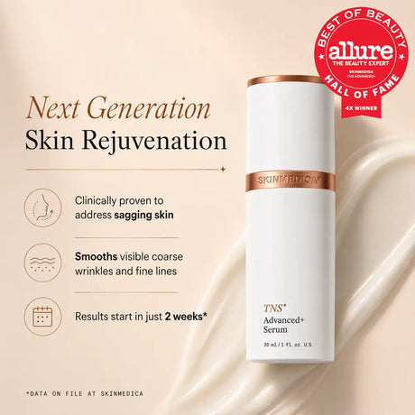 A bottle of SkinMedica TNS Advanced+ Serum on a warm beige background with cream-colored liquid swirls. The image includes marketing text about 'Next Generation Skin Rejuvenation' and an Allure Best of Beauty 4x winner award seal.