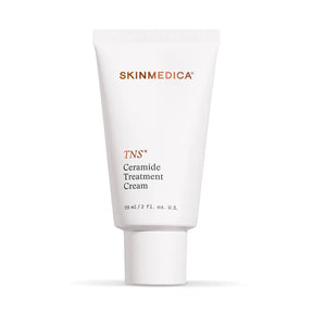 A white tube of SkinMedica TNS Ceramide Treatment Cream barrier support face lotion