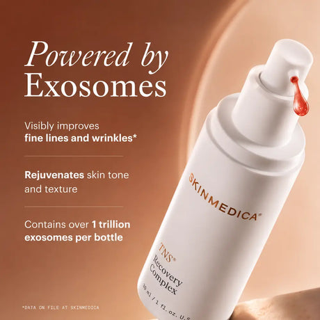 A bottle of Skinmedica TNS Recovery Complex exosome serum shown on a warm beige background with promotional text reading 'Powered by Exosomes' and product benefits.