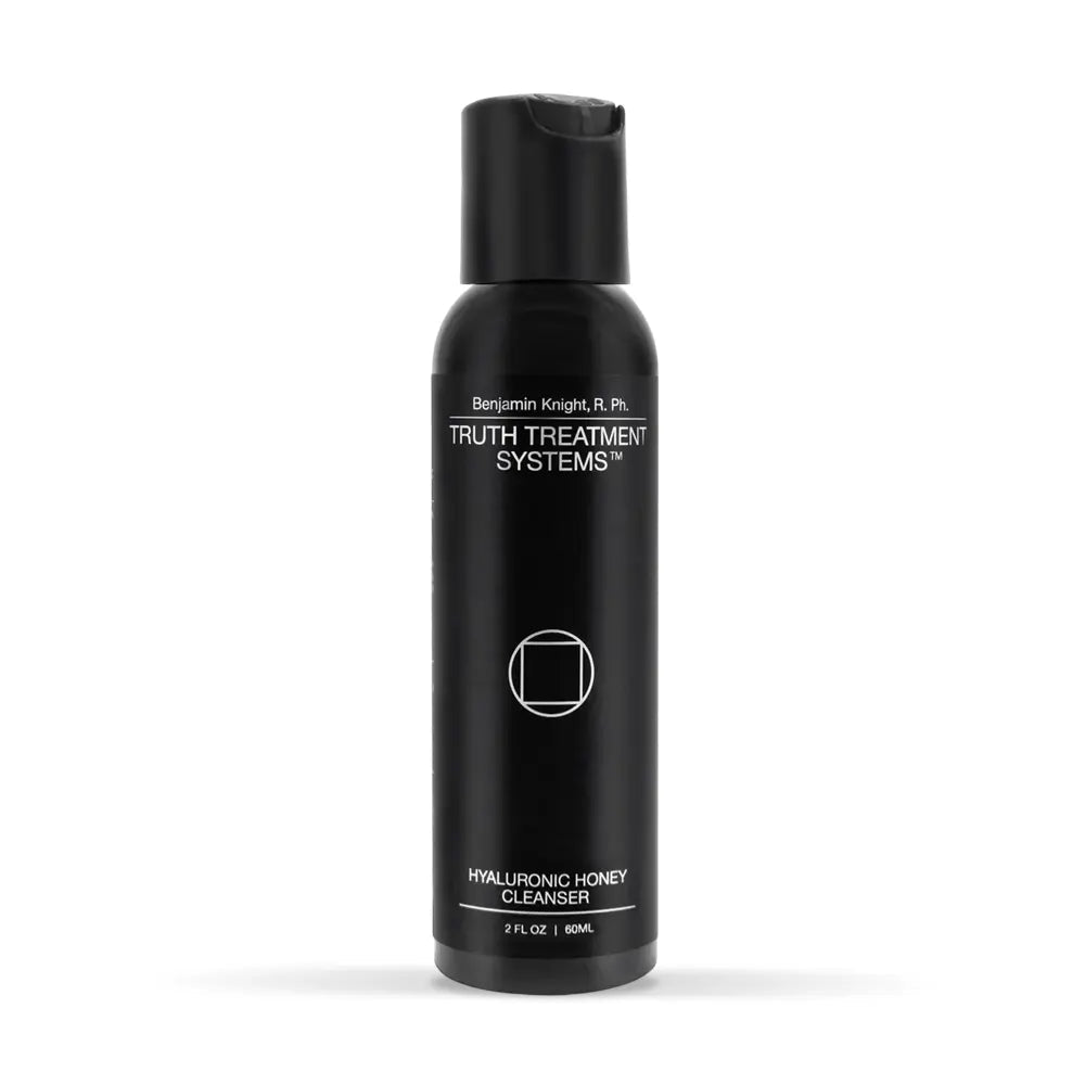 Black bottle of Truth Treatment Systems Hyaluronic Honey Cleanser 2 fl oz on a white background