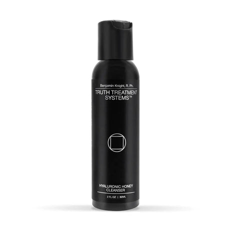 Black bottle of Truth Treatment Systems Hyaluronic Honey Cleanser 2 fl oz on a white background