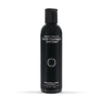 Black bottle of Truth Treatment Systems Hyaluronic Honey Cleanser 4 fl oz on a white background