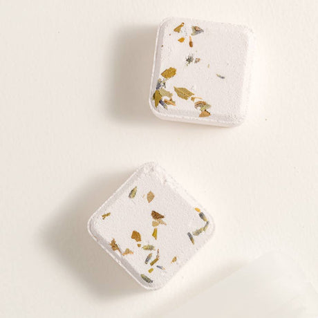 2 Mystic shower steamers in white background