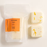 Pomander shower steamers in light background