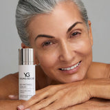 Woman holding a bottle of Young Goose Bio-Retinol