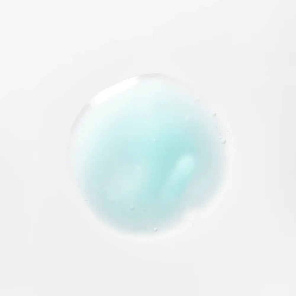 A single drop of Young Goose L.A.D.R. Serum shows product texture centered on a clean white background.