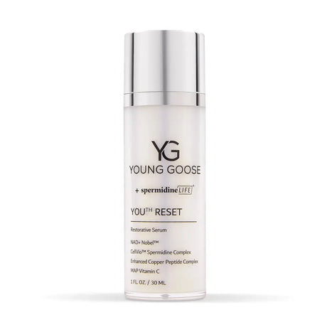 A full size bottle of Young Goose You Reset Restorative Serum on a clean white background. The bottle is frosted white with a shiny silver cap, featuring black text with the brand logo 'YG' and product name 'YOUNG GOOSE + spermidine-LIFE YOU RESET'.